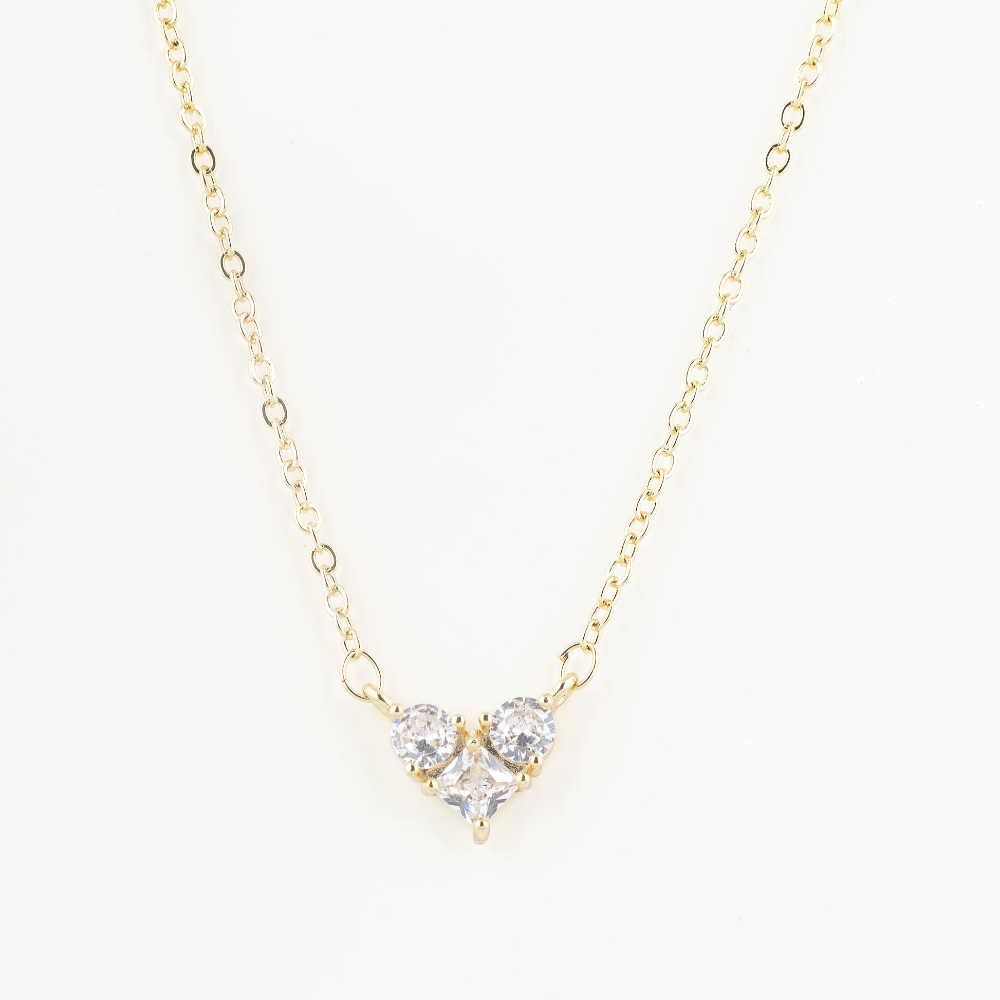 heart necklace in gold	- delphin jewels